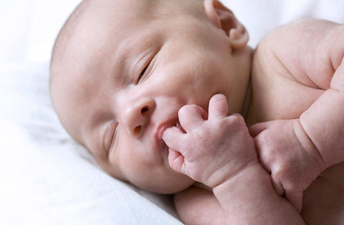 How to Read Your Newborn’s Body Language