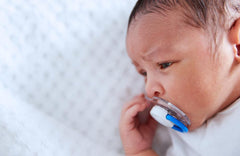A Trick for Getting Your Baby to Take a Pacifier